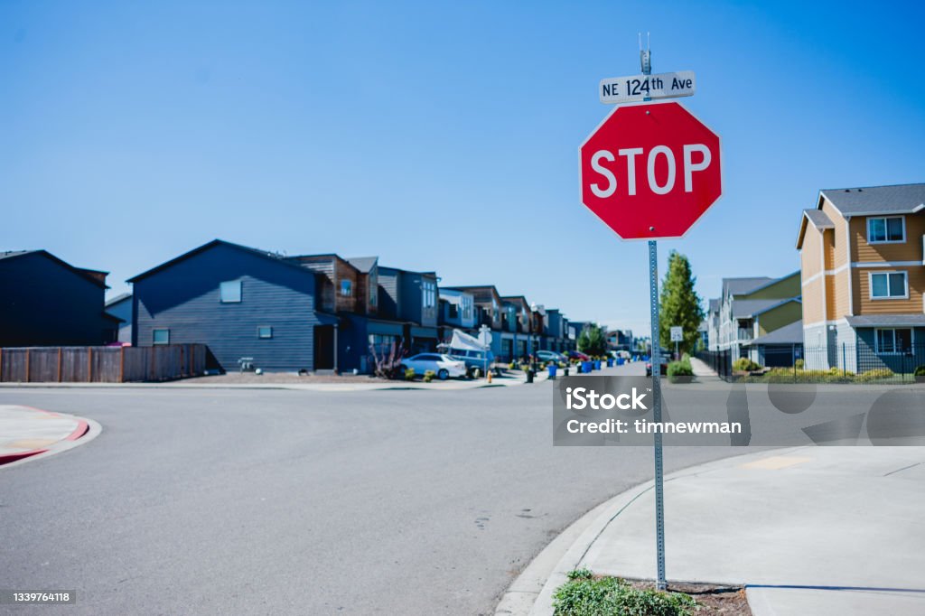 Stop Sign in Residential Neighborhood A residential neighborhood red stop sign located in a suburban development of Vancouver Washington State Stop Sign Stock Photo