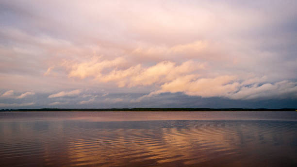istock sunrise clouds reflected in the lake Seliger Russia at dawn 1339770285
