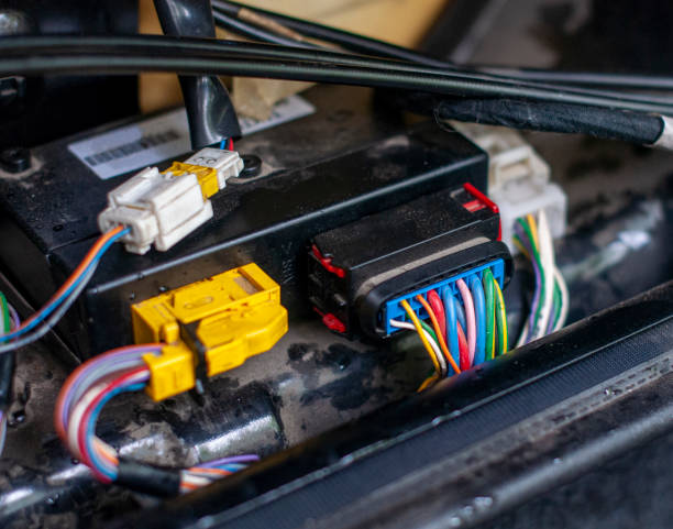 istock Automobile block with colorful wires. Car service. 1339779956