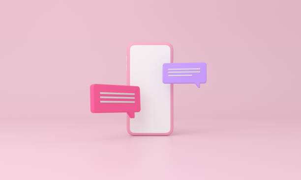 istock Smartphone and chat icon on pink background. 1339780007
