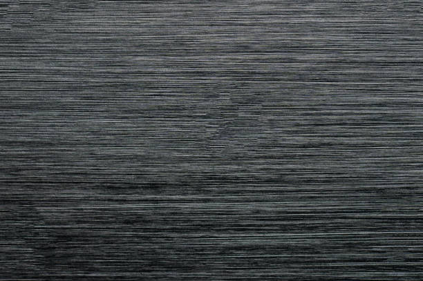 istock Brushed black metal background 1339780602
