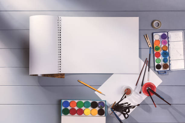 istock Drawing or painting in art studio. Top view mock-up background 1339782863