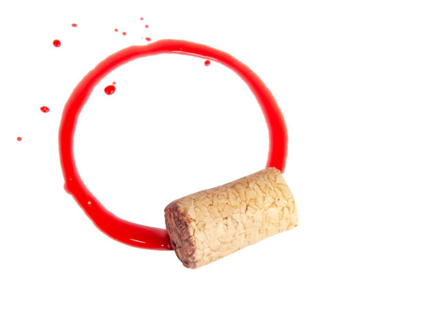 istock Wine cork and dirty red circle isolated on the white 1339784968