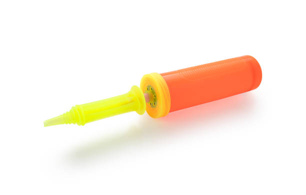 istock Hand air pump balloon on isolated white background 1339786458