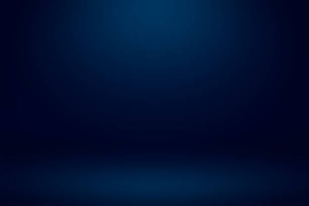 Empty dark blue studio room with light and shadow abstract background. Copy space studio room for present your products. Empty dark blue studio room with light and shadow abstract background. Copy space studio room for present your products. black blue stock pictures, royalty-free photos & images