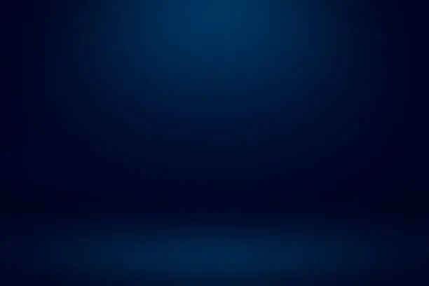 Photo of Empty dark blue studio room with light and shadow abstract background. Copy space studio room for present your products.