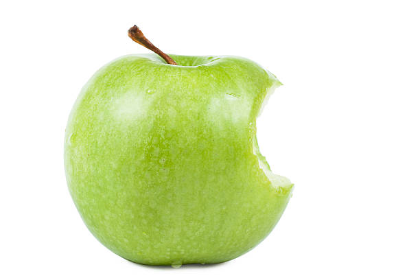 Apple Green apple without a bit isolated over white background apple with bite out stock pictures, royalty-free photos & images