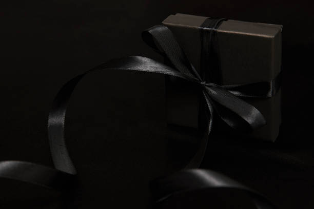 istock Black friday sale concept with gift box with ribbon 1339791452