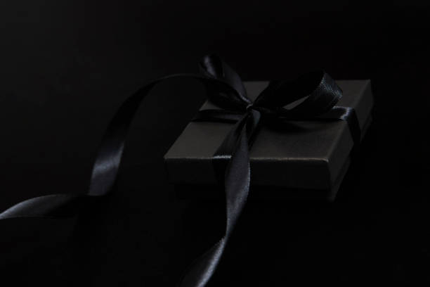 istock Black friday sale concept with gift box with ribbon 1339791532