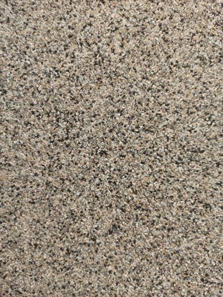 istock texture of plaster with stones 1339793341