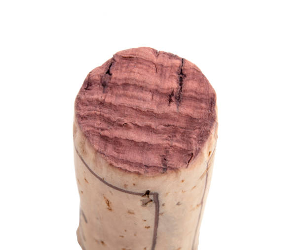 istock Vintage old wine cork isolated on the white 1339796417
