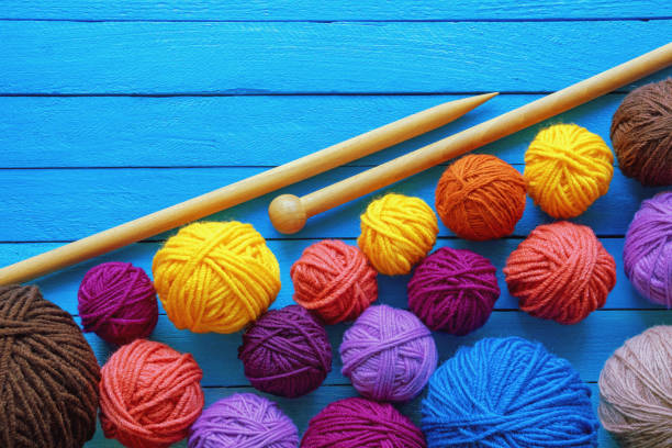 istock Colorful balls of wool and knitting needles 1339796529