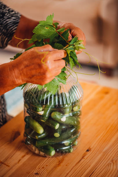 istock Woman Preparing Pickles at Home 1339797359