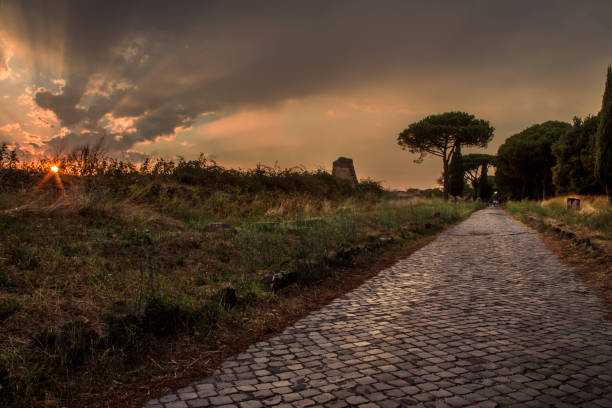 sunset on ancient roman road