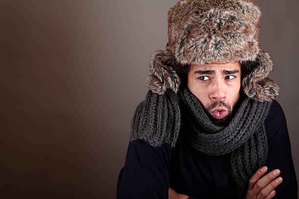 Male model in front of a dark background