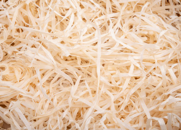 istock Sawdust for packing gifts texture or background 1339802111