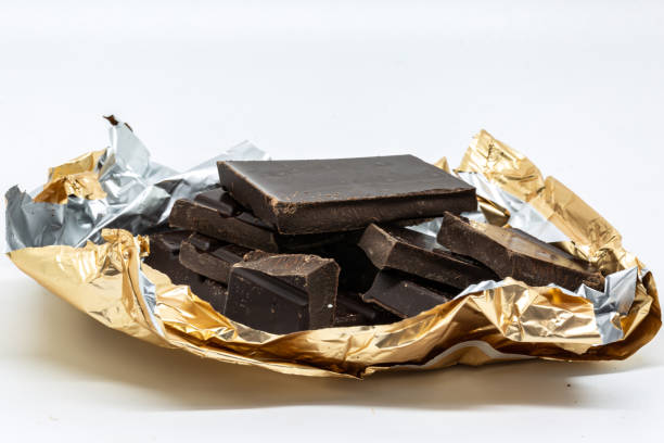 istock Dark Chocolate in Gold Foil 1339802529
