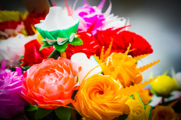 Arrangement of flowers made of rough textured felt.