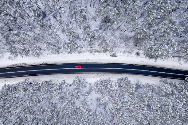 istock Snowplow clearing snow from the road. Transportation in winter. 1339805106