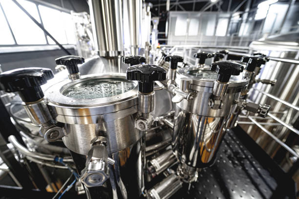 istock Craft beer brewing equipment in privat brewery 1339806870