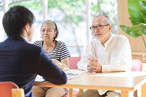 istock Professionals who give advice on inheritance to elderly couples 1339808438
