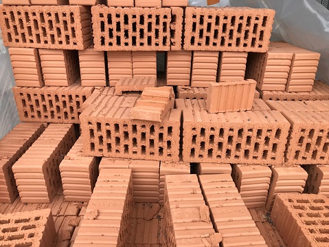 a stack of bricks at a construction site of a new home