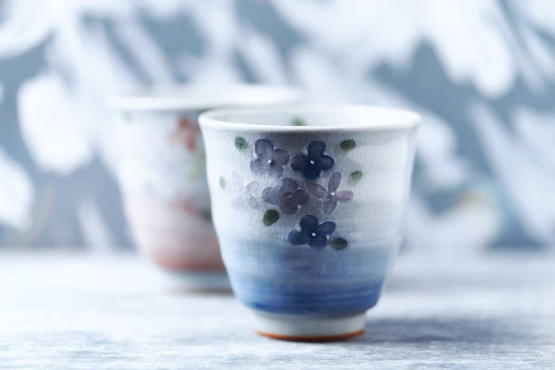 4 teacups in and intertwined arrangment