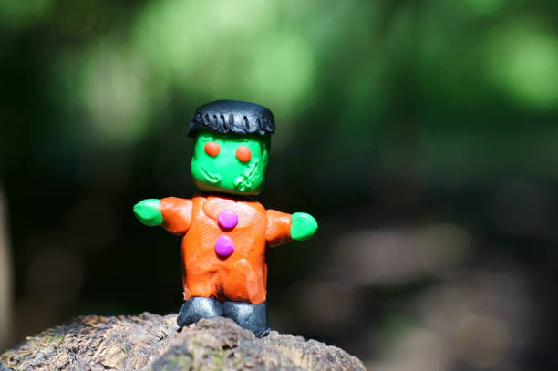istock Funny Frankenstein from plasticine close-up. 1339813581