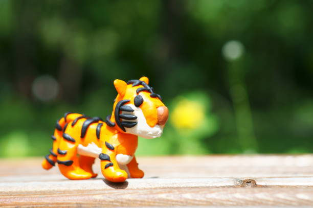 istock Tiger figurine made of plasticine close-up. 1339814368