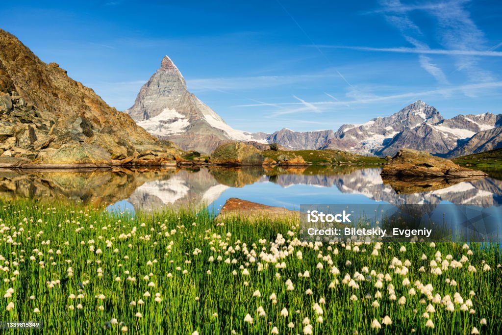 Matterhorn and reflection on the water surface at the morning time. Beautiful natural landscape in the Switzerland Matterhorn Stock Photo