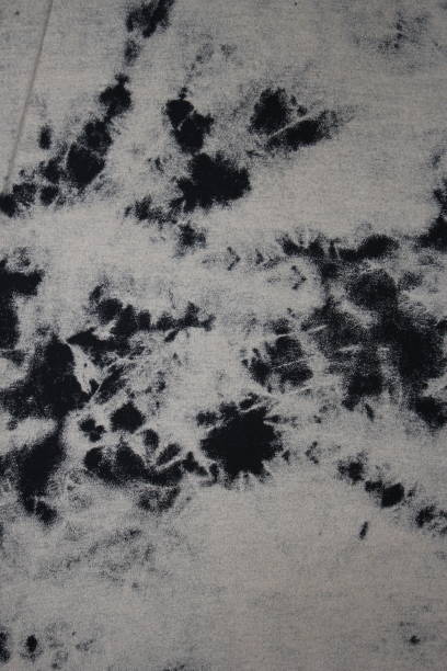 istock Tie dye black and white background with half circle layers fading from black to white monochrome dye fabric textile 1339816444