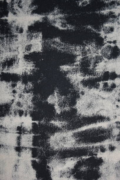 istock Tie dye black and white background with half circle layers fading from black to white monochrome dye fabric textile 1339816453