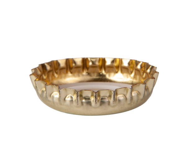 istock Metallic bronze beer cap isolated on the white 1339816870