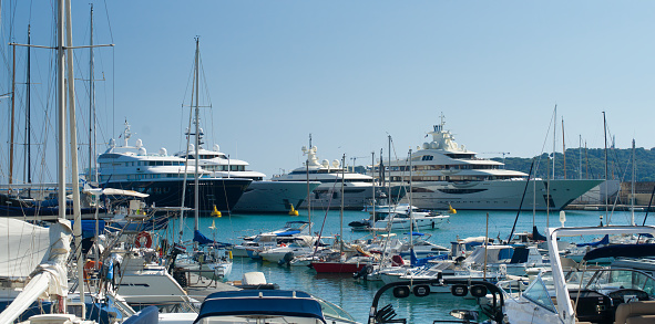 Mega yacht in the Antibes harbor on a sunny day in september