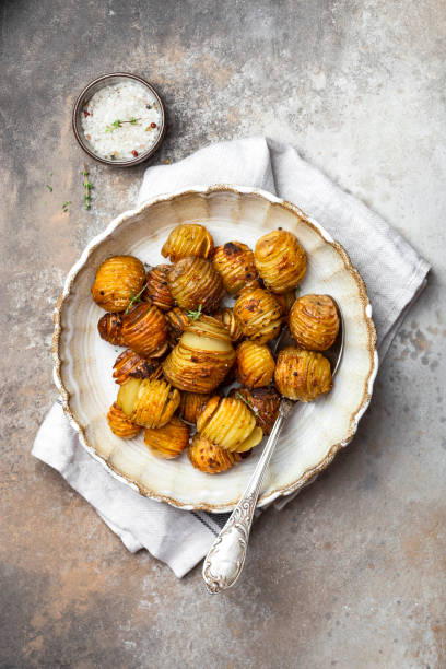 istock baked potatoes with thyme, rosemary and garlic 1339823945