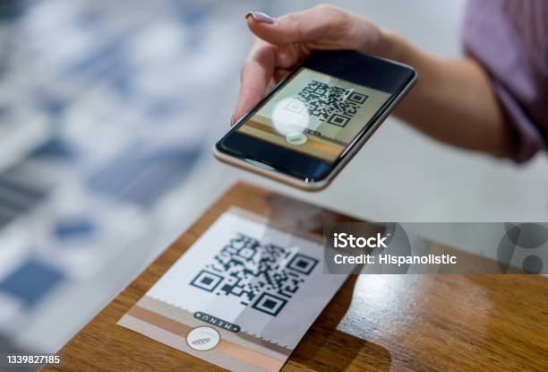 Closeup On A Woman Scanning A Qr Code At A Restaurant Stock Photo - Download Image Now