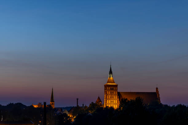 St. James in Olsztyn, Garrison Church - evening, a place for tact