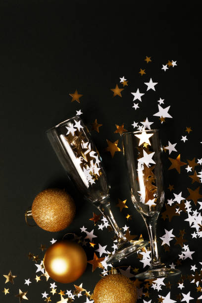 istock Christmas stars background, gold and black glow 1339833294