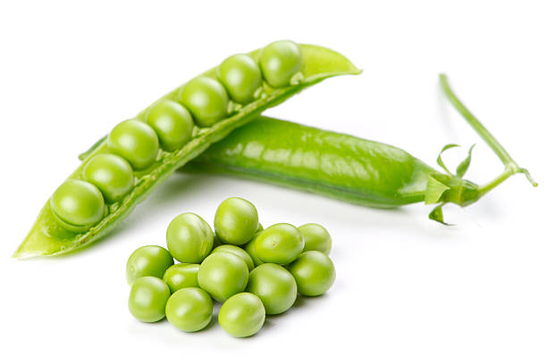 istock Fresh green pea pod over white background 133983514