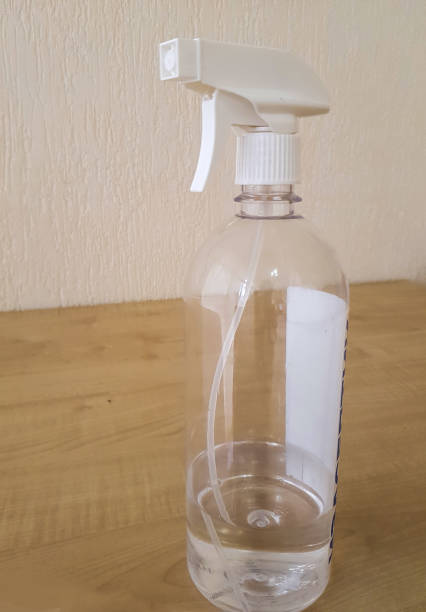 istock Disinfection and hygiene concept, spray bottle with antiseptic on the table 1339836893