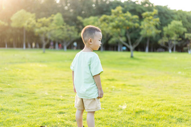 istock Children laughing in the sunset 1339837333