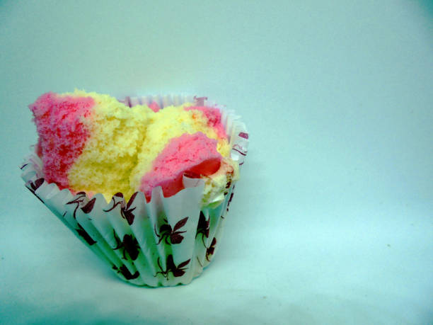 istock Bolu kukus, Indonesian cake with white background 1339837381