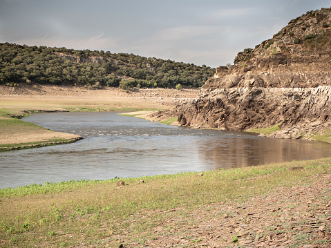 Record low water level of shrinking ricobayo reservoir in spain. Climate change concept