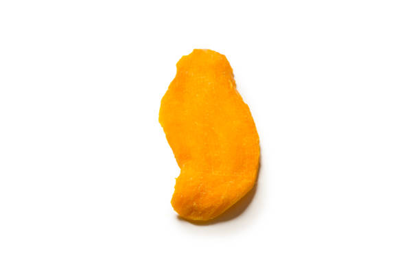istock Dry tasty mango slices isolated on a white background. 1339841624