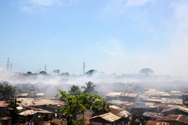 istock Freetown - burning garbage - garbage dump, smoke and smell from the King Tom dumpsite, Sierra Leone 1339841879