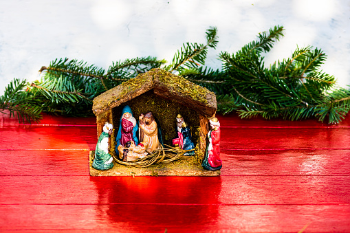 Colorful Nativity Scene with baby Jesus against Christmas background