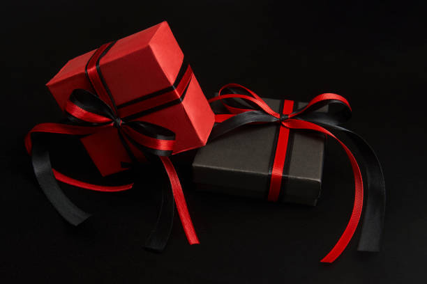 istock Black friday sale concept with gift box with ribbon 1339844400