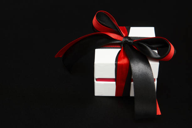 istock Black friday sale concept with gift box with ribbon 1339844406