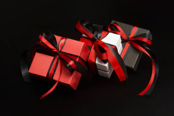 istock Black friday sale concept with gift box with ribbon 1339844421