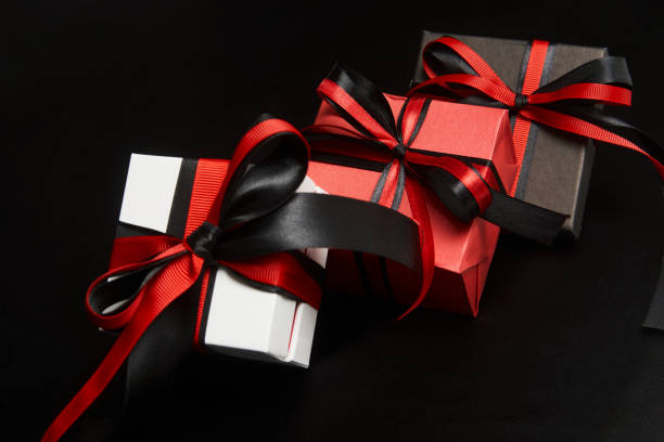 istock Black friday sale concept with gift box with ribbon 1339844422